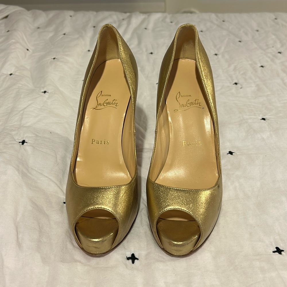 Louboutin gold peep-toe heels